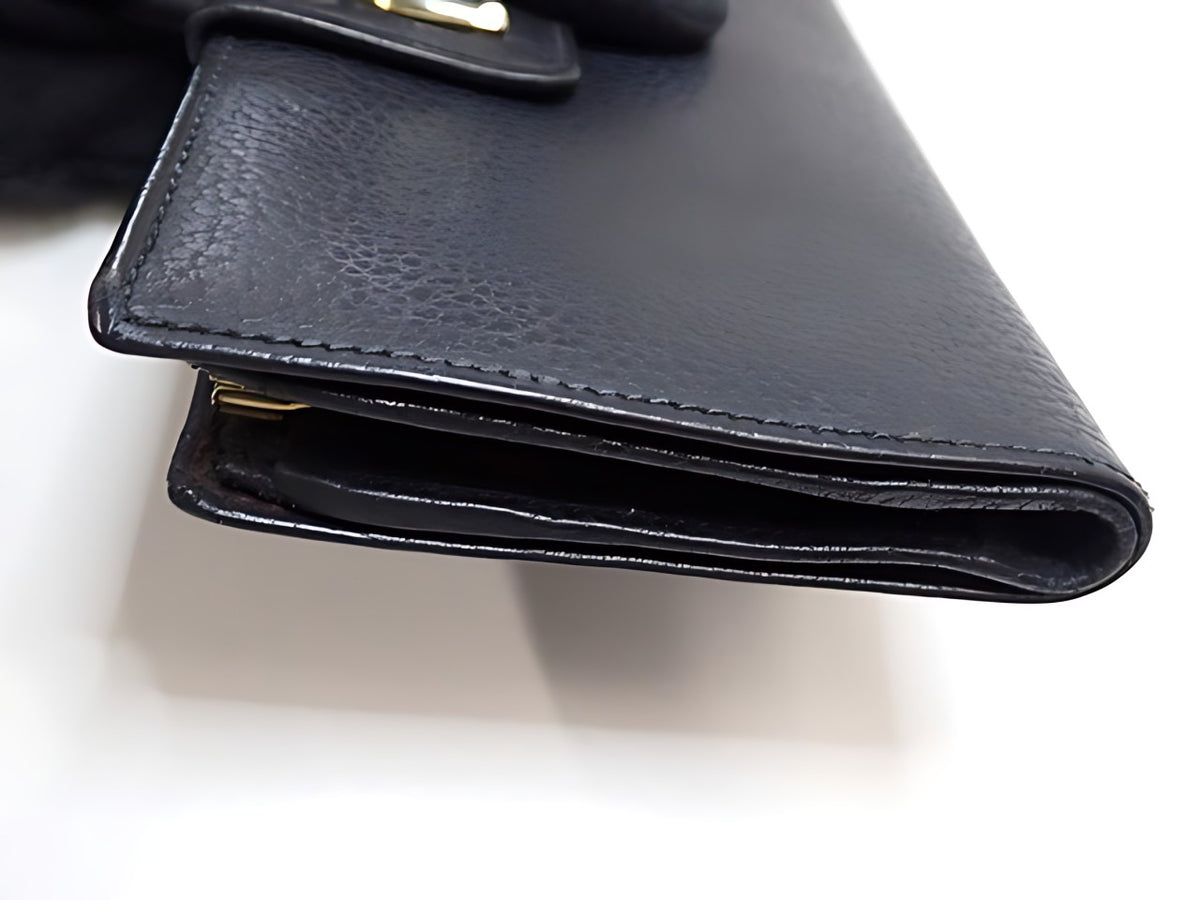 Gucci Vintage Étrier Cuir Grainé Noir Portefeuille Fermoir Doré – détail 02
