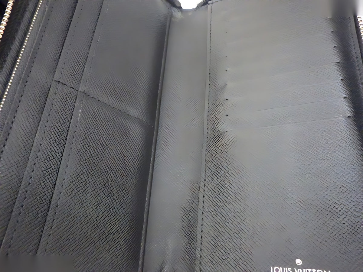Louis Vuitton Zippy Vertical Épi noir — détail 7